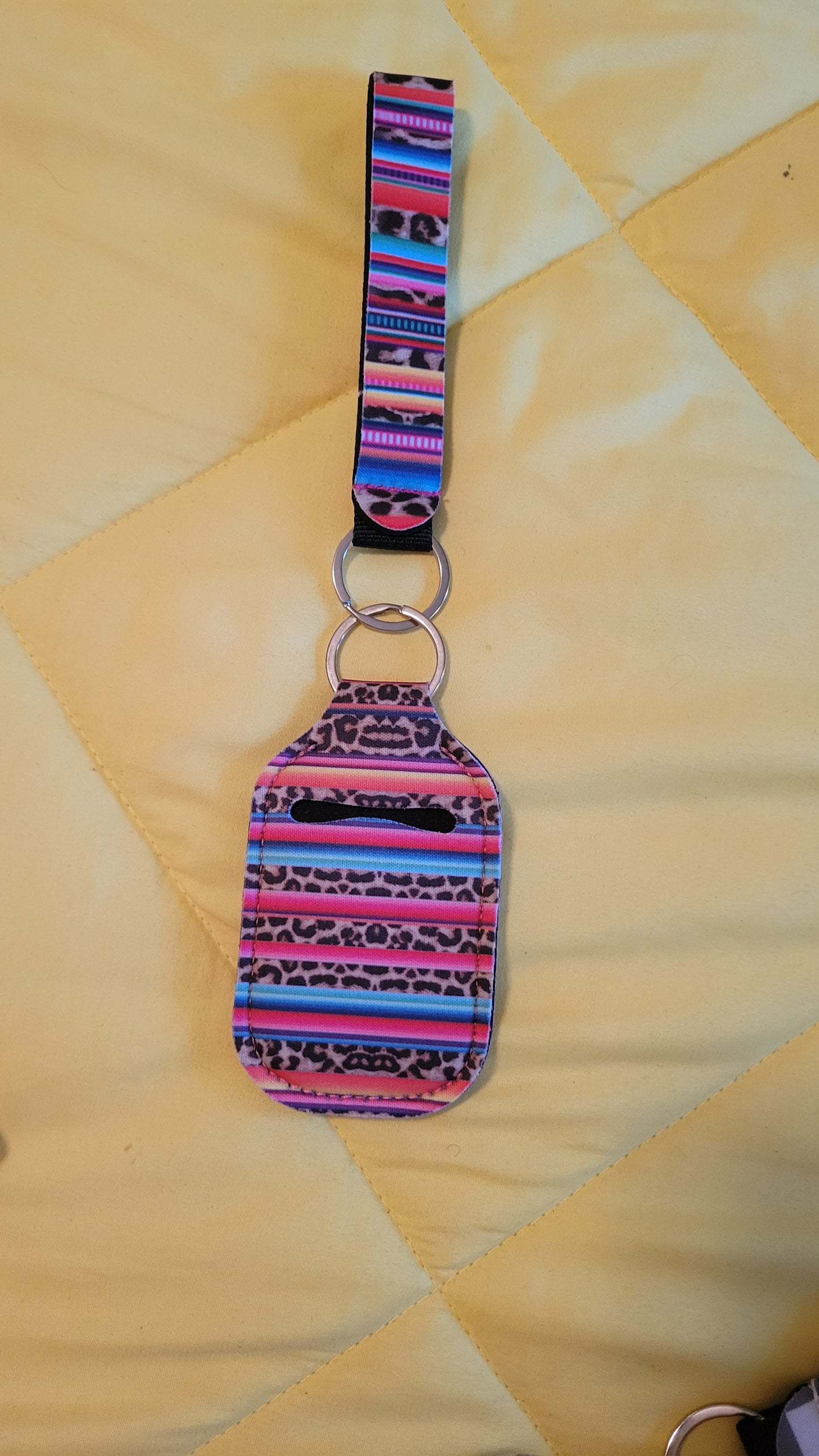 Hand sanitizer holder keychain