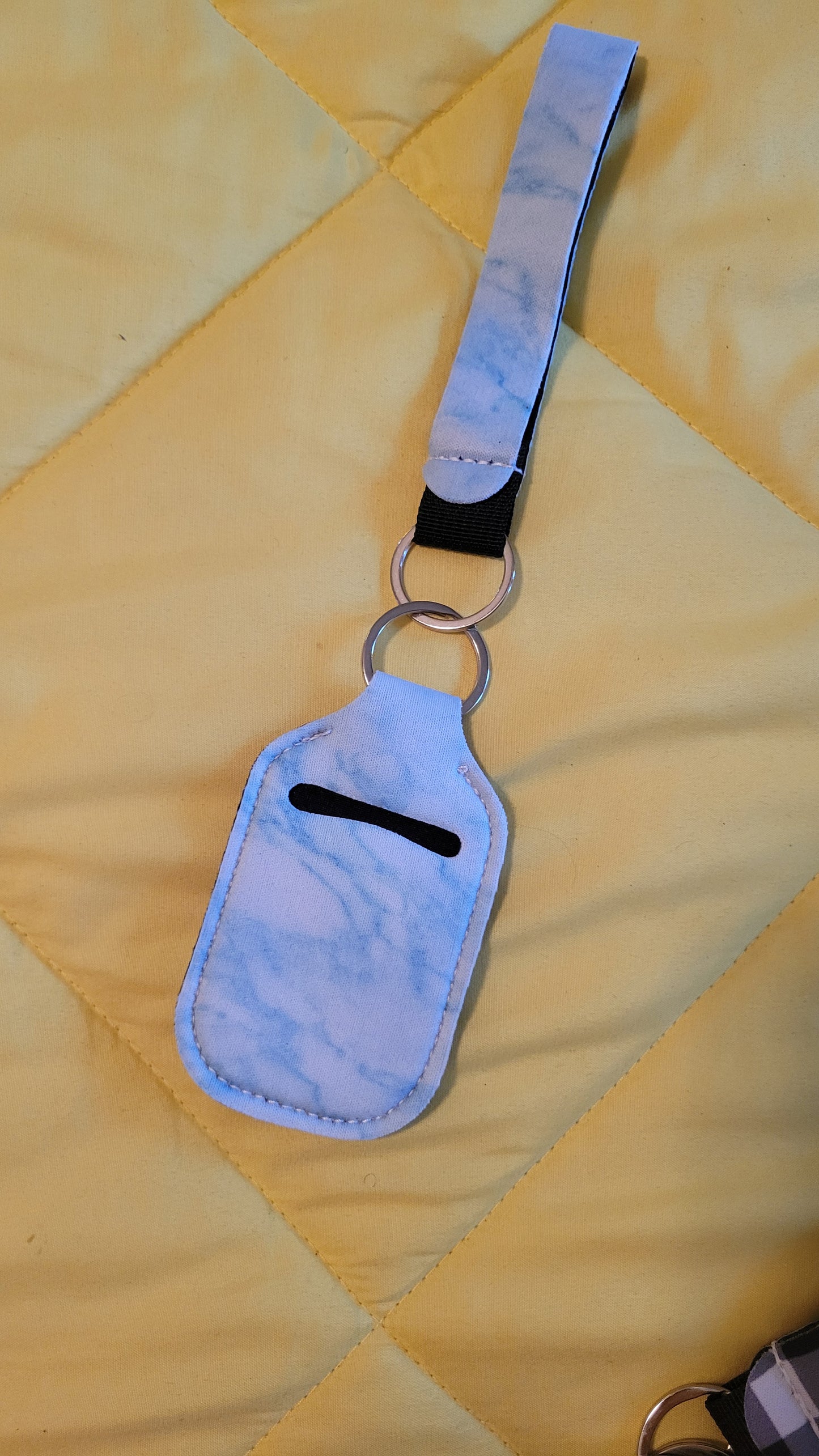 Hand sanitizer holder keychain